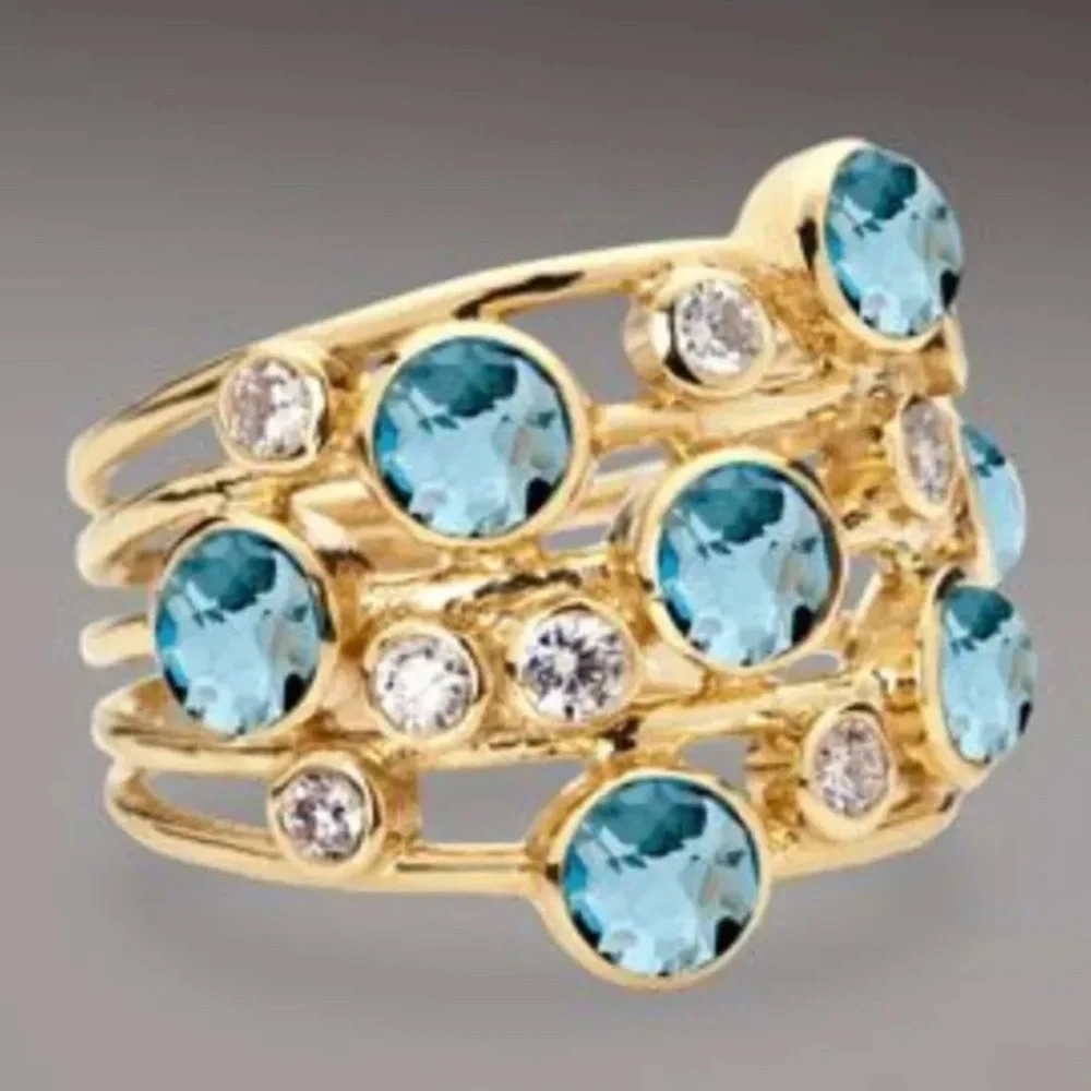 Gold plated ring size 7 with Swarovski crystals in white and blue zircon NWT